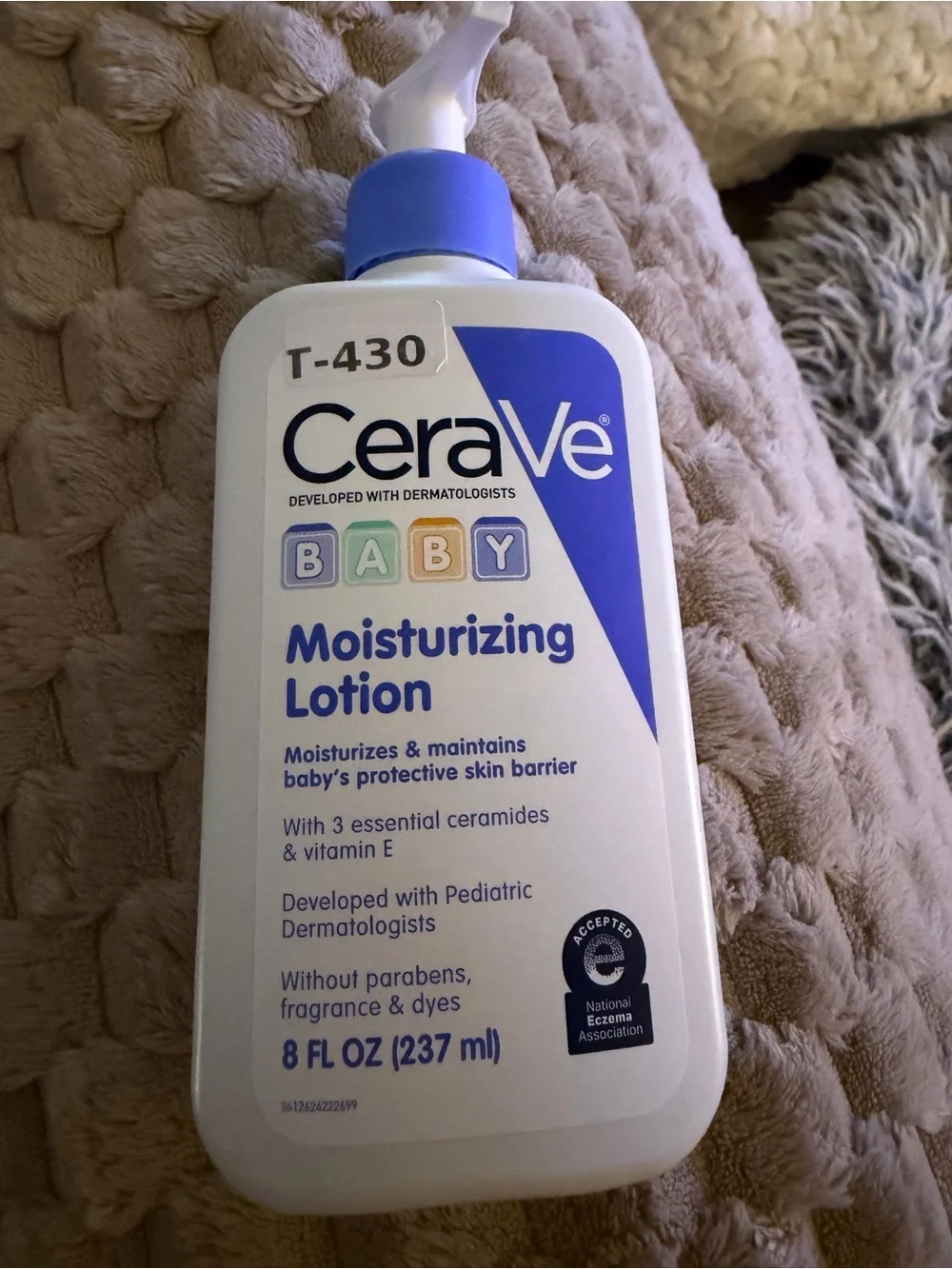 rave White & Blue Moisturizing Lotion Bottle